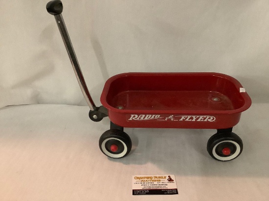 Vintage Radio Flyer doll size red pull wagon, metal and plastic approx 14x8x14 inches.
