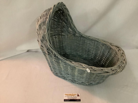 Vintage woven bassinet basket, approximately 20 x 17 x 13 inches.