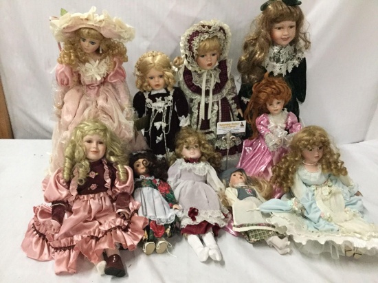 10x porcelain dolls. Chatelaine and more. Largest doll measures approximately 22x8x5 inches.