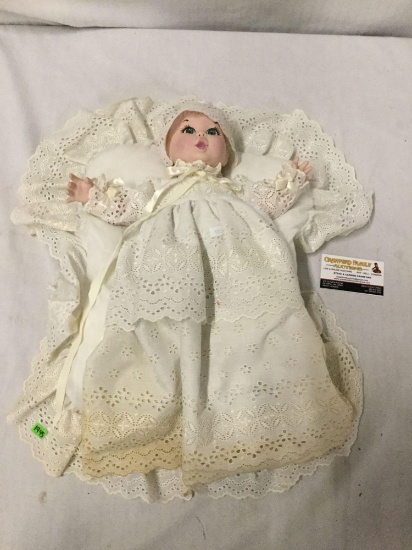 Vintage porcelain Baby doll with pillow signed c400. Measures approximately 14x13x2 inches.