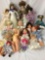 Fifteen vinyl, porcelain, cloth, and composite dolls from makers like Danbury Mint, Cititoy, and