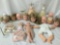 Lot of various vinyl and plastic doll heads, limbs, and hair. Includes decorative jewelry stands and