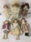 Six unmarked vintage porcelain dolls, one made by Westminster. Approx. 7x19x4 inches. JRL