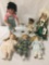 Six porcelain dolls from makers like Tuss, Royal Courts, and Geppeddo. Largest doll approx. 9x21x4.5