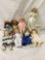 8x vintage and modern porcelain and vinyl dolls. Eegee and more. Largest doll measures approximately