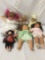 8x Vinyl and Porcelain Dolls. Pat Secrist, gepeddo and more. Largest bear measures approximately