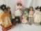 Eight porcelain and composite dolls from Franklin Mint, Marie Osmond, and others. Largest doll