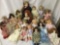 Twenty-one vinyl, porcelain, and cloth dolls from makers like Eegee Co., Cititoy, Heritage Mint, and