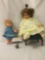 One 1971 Zapf Doll signed in vinyl, one 1974 Lorrie doll, and one doll ottoman. Largest doll is
