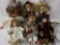Six porcelain and composite dolls from makers like Danbury Mint. Largest doll measures approximately