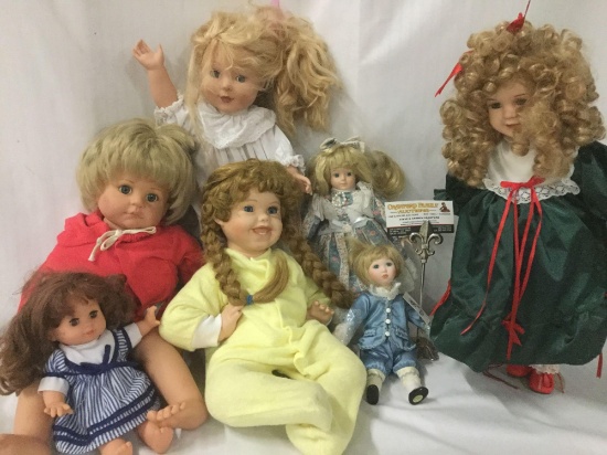 Seven vinyl, composite and porcelain dolls from makers like Gotz, Showstoppers, and more. JRL