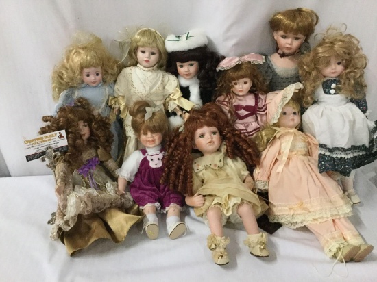 Ten porcelain dolls from makers like House of Lloyd, PCI, Heritage Mint, and others. Largest doll