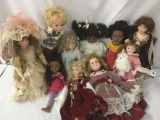 Ten porcelain and composite dolls from makers like G2G and Collectible Memories. JRL