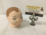 German doll head from 1923, by artist Grace S. Potnam and maker Duncan. Measures approximately