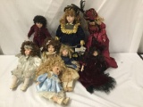 8x porcelain and composite dolls. Collectors choice and more. Largest doll measures approximately