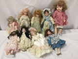 9x porcelain and composite dolls. Savoy collection and more. Largest doll measures approximately