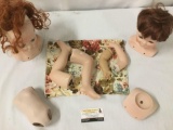Huge lot of baby Ceramic and porcelain doll parts. Over twenty doll limbs and heads. Box Approx
