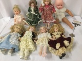 Lot of eight porcelain and vinyl dolls from Geppeddo, Pat Secrist, and others. Approx.