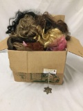 Open box lot of doll wigs. Box itself measures approximately 17x13x13 inches.