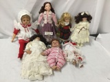 7x porcelain and vinyl dolls. Broadway collection and more. Largest doll measures approximately