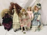 Vintage and modern porcelain dolls. Bella Rose and more. Largest measures approximately 29x10x5