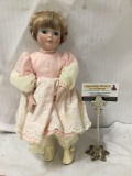 1989 porcelain Brinns Limited Edition 82/12500 doll. Measures approximately 16x7x4 inches.