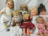 Lot of eight ceramic, soft vinyl, and porcelain dolls by makers like Heritage Mint and Mattel. JRL