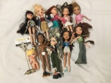 10x Bratz Dolls. Some missing feet and arm. Largest doll measures approximately 10x3x1 inches.