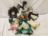 6x vinyl, composite, and porcelain dolls. Largest dolls measures approximately 16x10x5 inches.