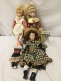 4x composite, porcelain and plastic dolls. Collectors choice, brass key, and more. Largest doll