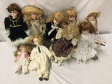 9x porcelain and composite dolls. Heritage Mint, house of Floyd and more. Largest doll measures