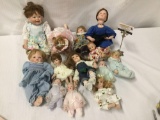 13x porcelain and composite dolls. Gepeddo and more. Largest doll measures approximately 15x8x4