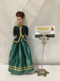 Modern Mattel green gown Barbie. Measures approximately 12x4x2 inches.