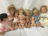 Nine vinyl and composite dolls, makers include Playmates Toys, Effanbee, Alexander Toy Co., and