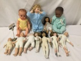 11x porcelain, plastic, composite, and Vinyl dolls. Berenger and more. Largest doll measures