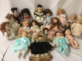 Twenty-two vinyl, composite, and porcelain dolls from makers like Marie Osmond, Angelina Visconti,