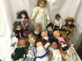 Seventeen porcelain, cloth, and vinyl dolls from makers like Showstoppers, Heritage Mint, Alexander,