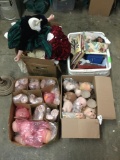 Open box lot. 4 boxes of doll parts, broken dolls, books and tools. Lots of heads. Largest box