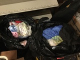 Open bag lot . 3 large plastic bags full of doll clothes. Largest bag measures approximately