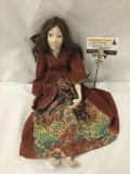 Vintage porcelain Renaissance Fair doll. Broken thumb. Measures approximately 18x7x5 inches.