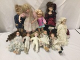 10x porcelain, vinyl and composite doll lot. Battat and more. Largest doll measures approximately