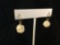 Pair of 14k gold earrings feat. a pearl cluster marked JCM 14k - 3.4 grams ttw