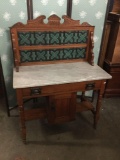 Antique 1800s marble top washstand with drawer/cabinet and tile backsplash with molding