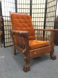 Antique oak reclining chair with stick and ball design sides and carved front - as is