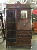 Antique dark tiger oak secretary curio cabinet with floral molding and brass fixtures