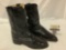 A pair of Justin?s Black leather cowboy boots, made in USA style 3/33, has tear in leather,