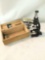 Vintage Wollensack microscope with case and 2 slides. It measures approximately 7.5x3x3.5 inches.