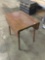 Vintage drop leaf table. Wear and tear. Measures approximately 43x32x30 inches.