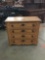 Vintage four drawer dresser with floral pattern. Measures approximately 39x35x17 inches.