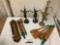 Lot of wooden kitchen tools with rack, metal Thai figure statues (damaged), wood/brass wall